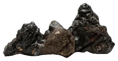 Raw pieces of shilajit resin as found in the mountains