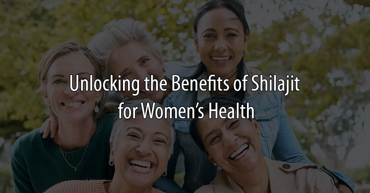 Four smiling women of different ages outdoors